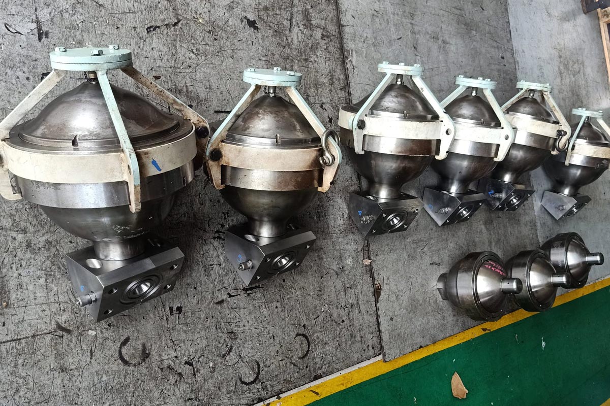 Offshore mechanical engineer performing marine engine overhaul inside ship engine room