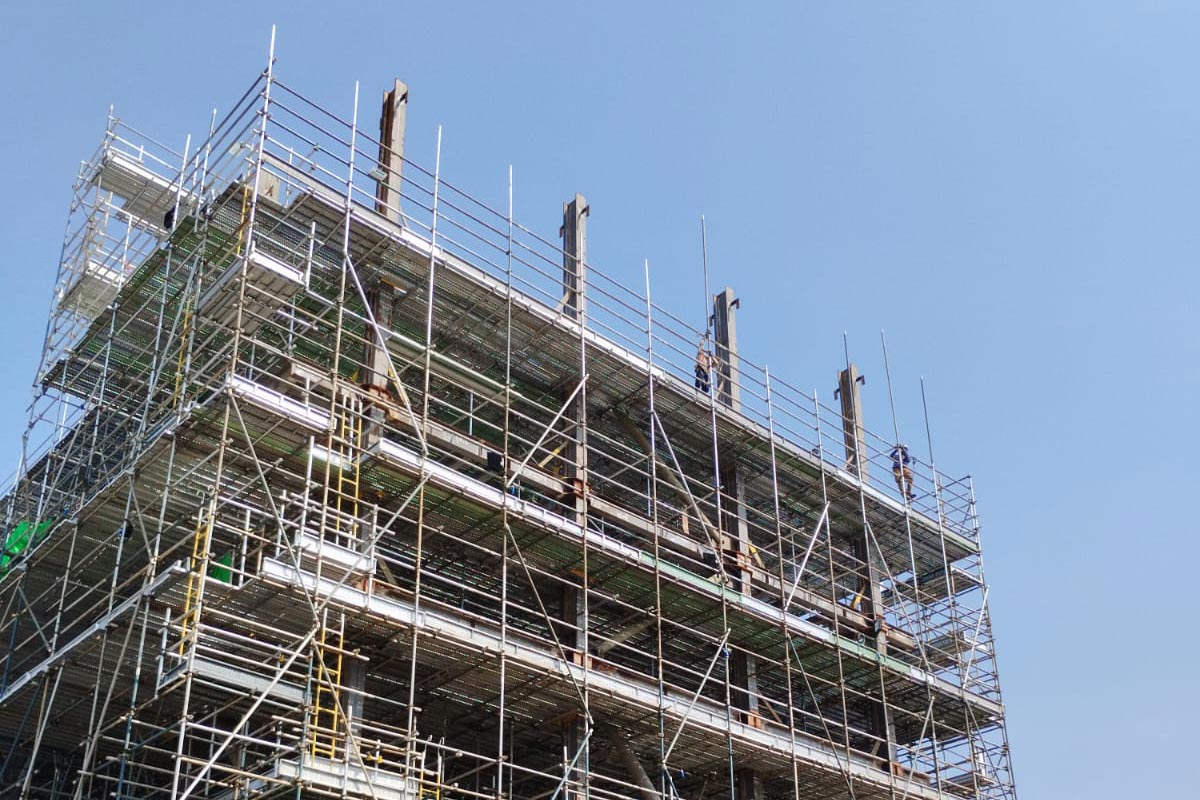 Offshore scaffolding system installed on vessel hull for safe access during marine maintenance and repair operations